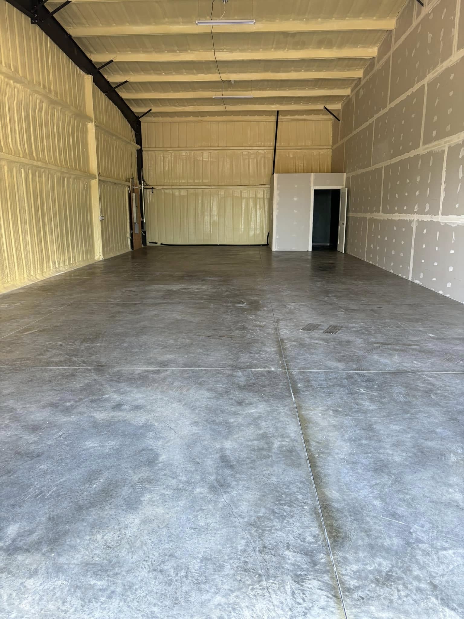 Warehouse bay with insulated walls and polished concrete floor