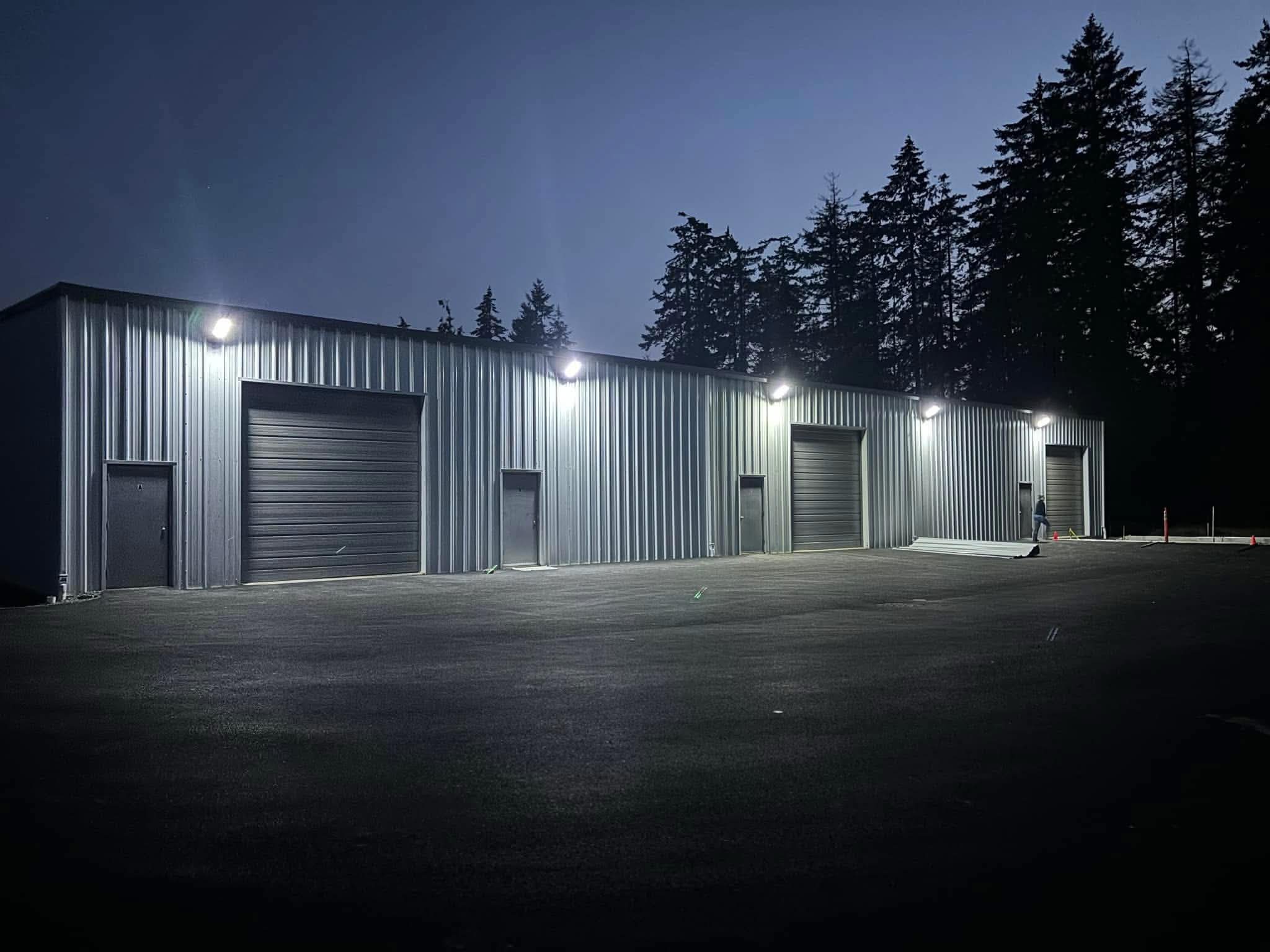 Exterior of the Titterness LLC warehouse building at night